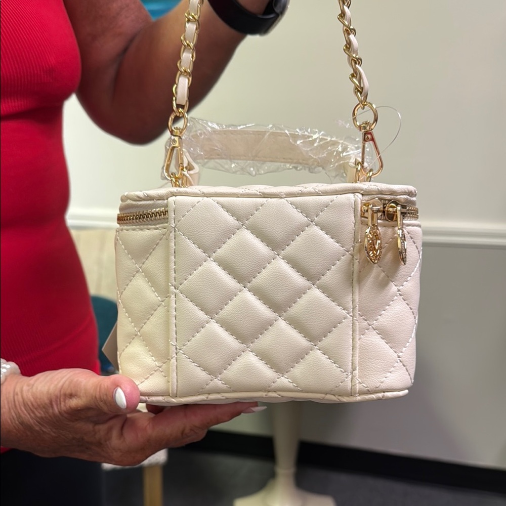 Valentino Orlandi Cream and Gold Mini Bag with Quilted Design
$99.00 TODAY ONLY - Picture 2 of 14